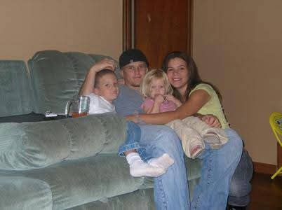 Our original family photograph together on the couch in the early years.